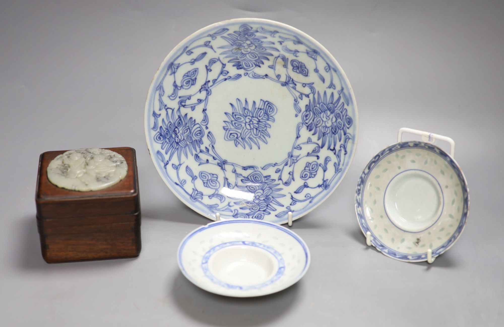 A Chinese jade and wooden box and three pieces of blue and white porcelain, largest diameter 20cm